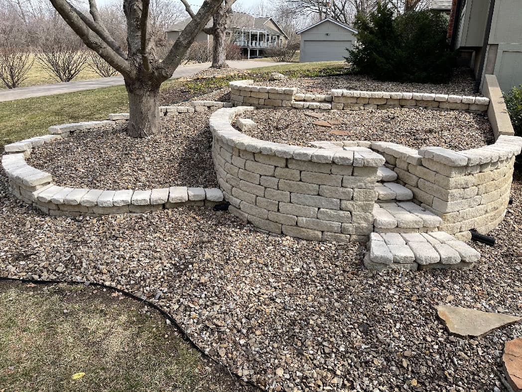 3 story house with a roofless deck on the second floor with stairs taking you downstairs